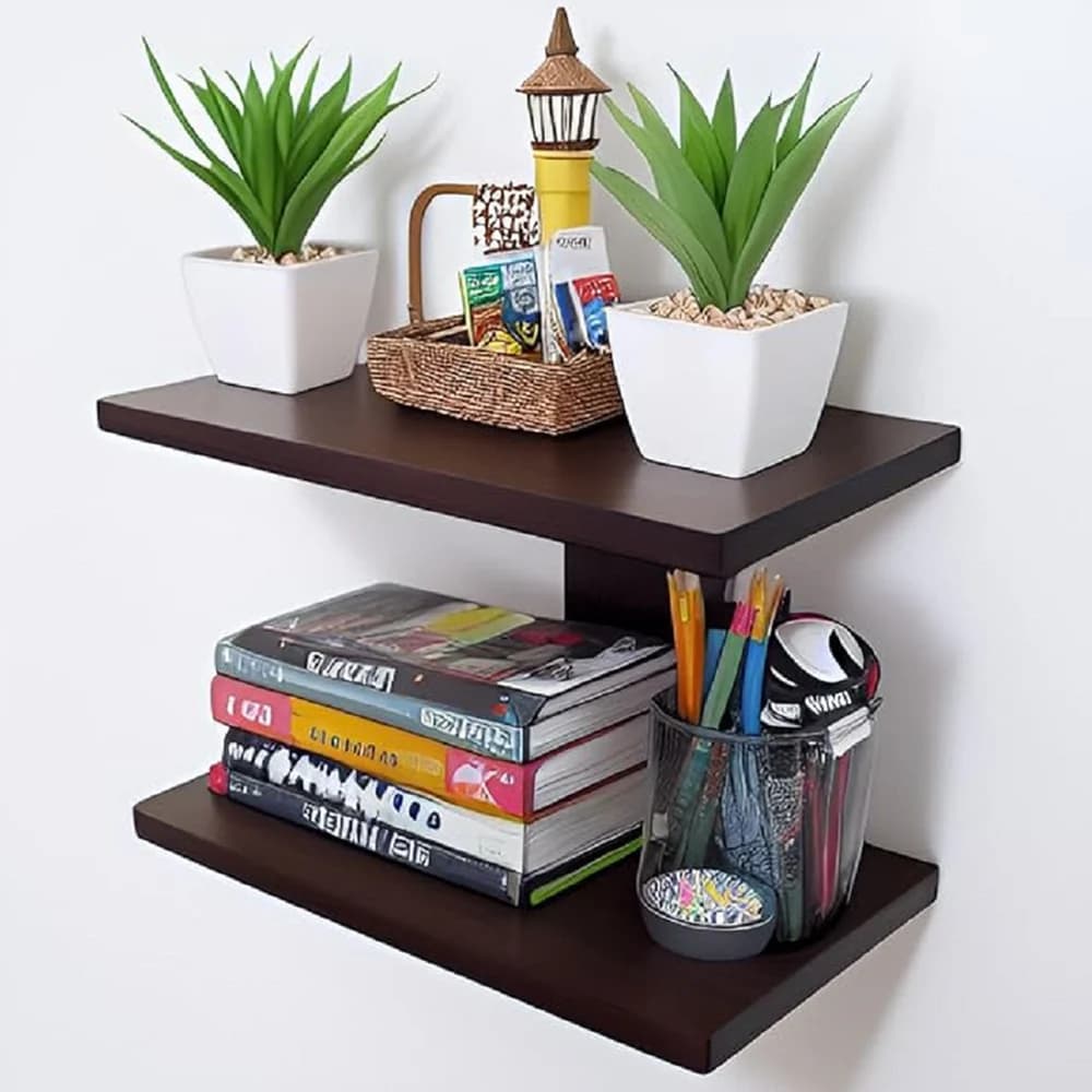 Two dark wenge floating wall shelves holding books, plants and desk supplies